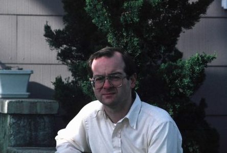 Andrew sitting on his front step